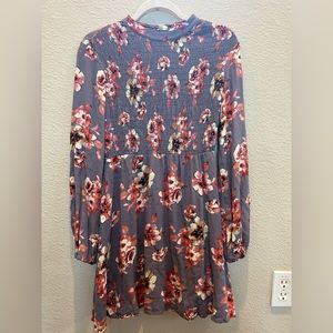 A short Lush dress that is purple with a pretty floral design!